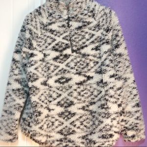 White and black tribal print Sherpa zip up.